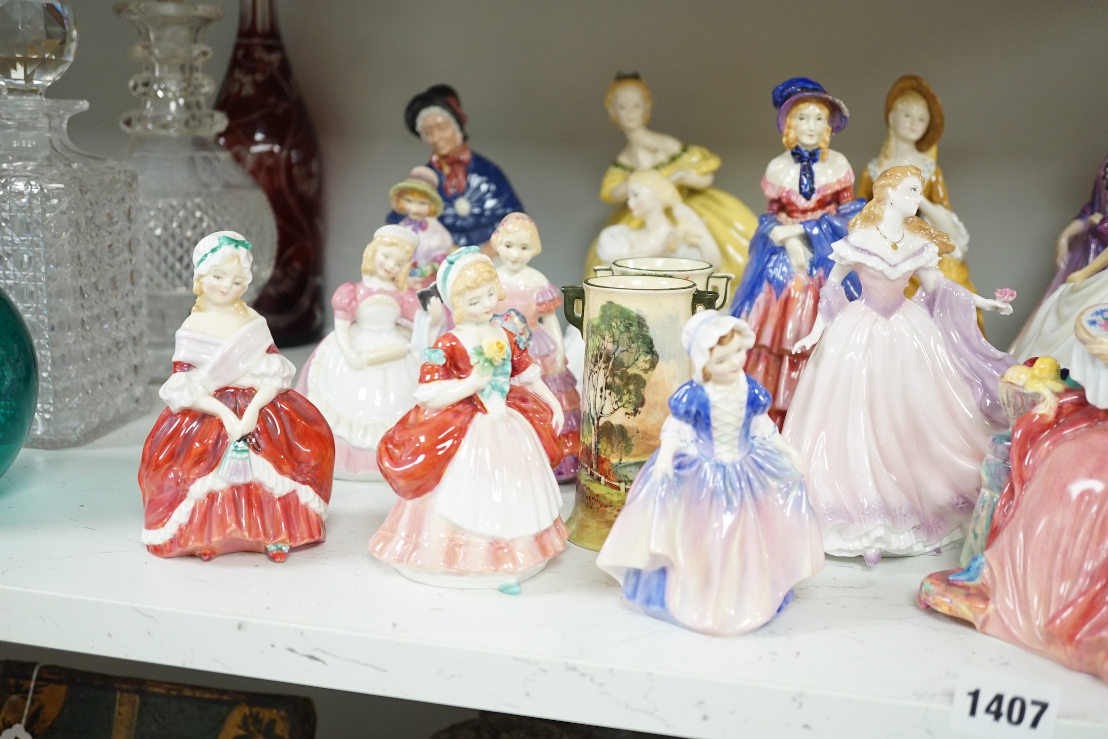 A quantity of Royal Doulton figures to include Peggy, Valerie, Dinky Do, Penelope, Cissie, and others (approx. 24)